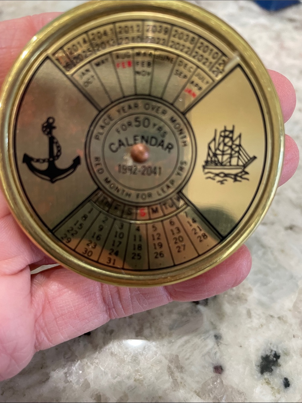 Brass round perpetual calendar